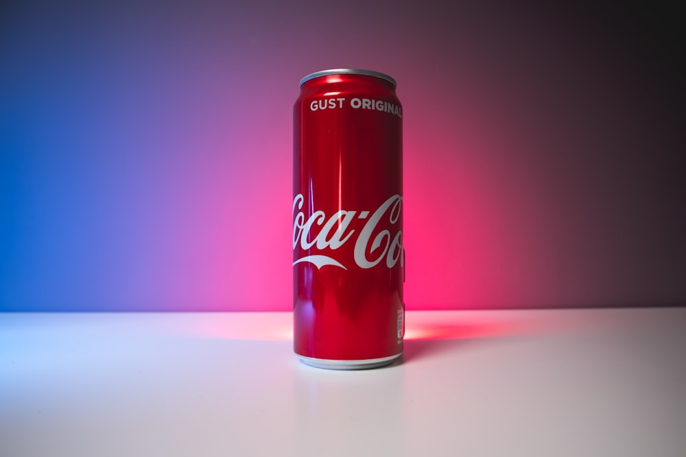 coca cola can on white table