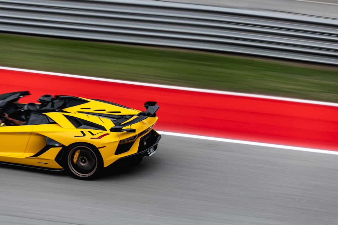 yellow and black lamborghini aventador on track