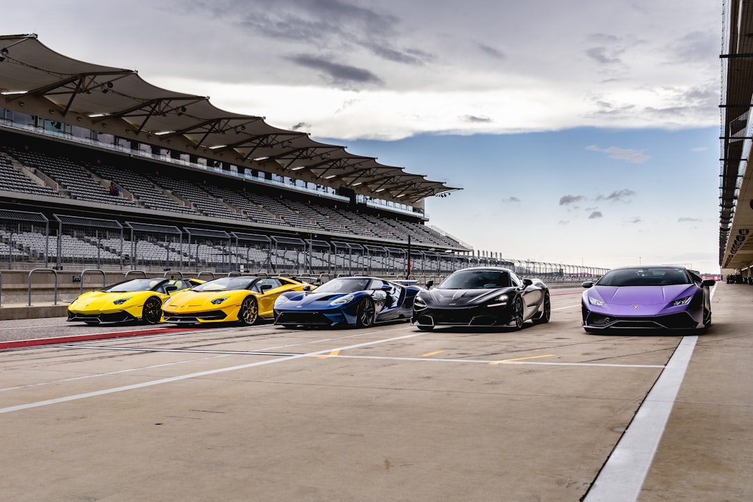 cars parked on parking lot during daytime