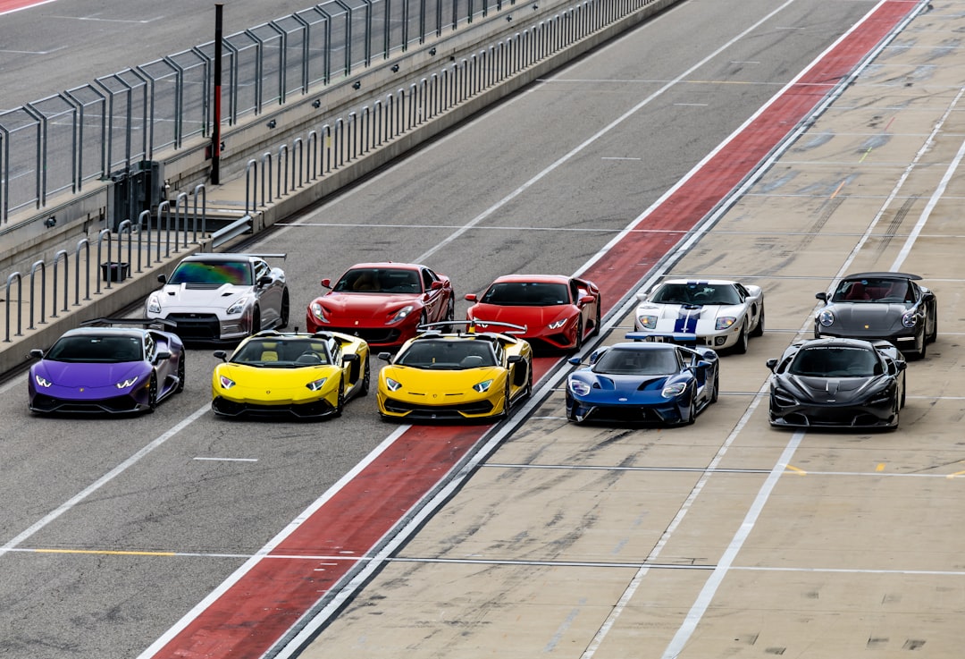 cars parked on parking lot during daytime