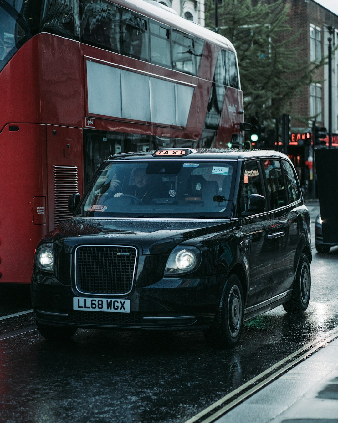 black mercedes benz g class parked on street during daytime