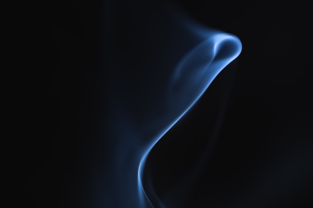 white smoke on black background