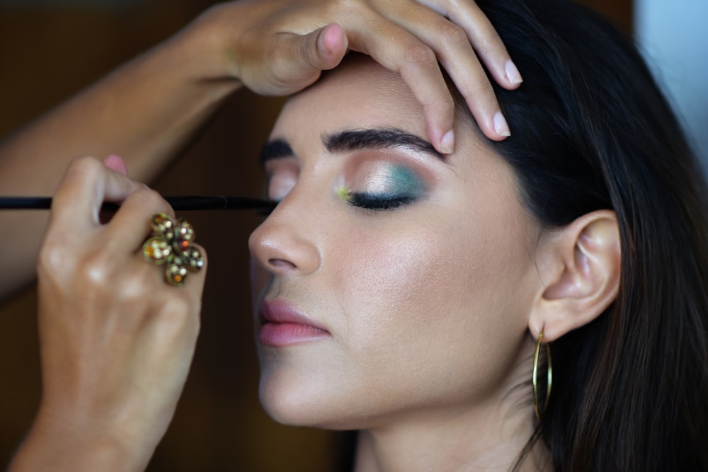 woman with gold ring and gold ring