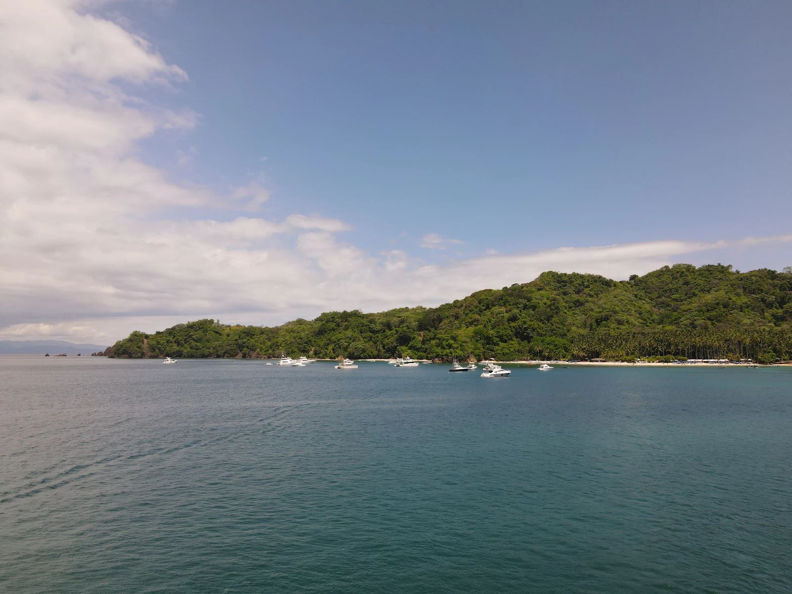 Boats anchored off a sheltered Pacific bay in Costa Rica