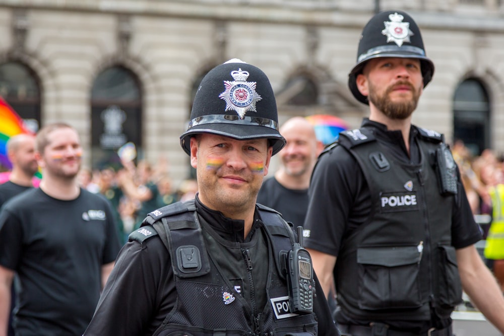 man in black police uniform wearing black helmet