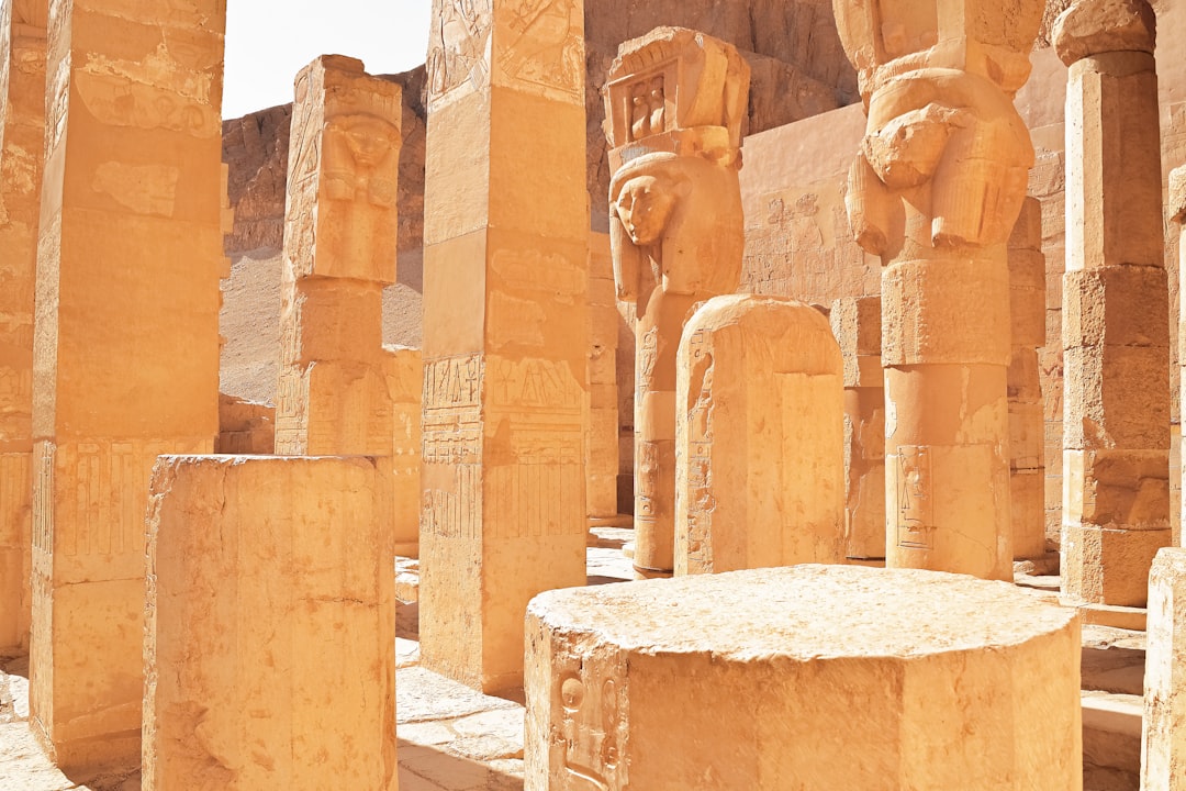 brown concrete statues during daytime