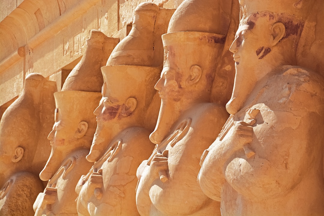 brown concrete statues during daytime