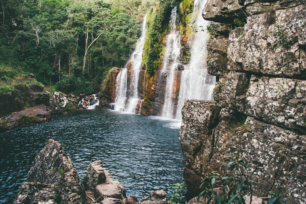 water falls on rocky mountain