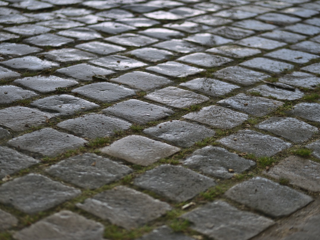 grey brick pavement during daytime