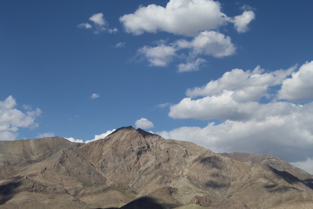 brown and gray mountain under blue sky during daytime