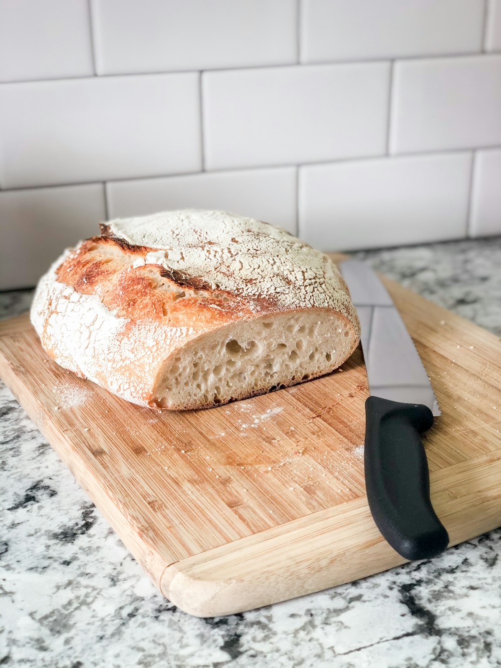 bread on brown wooden chopping board