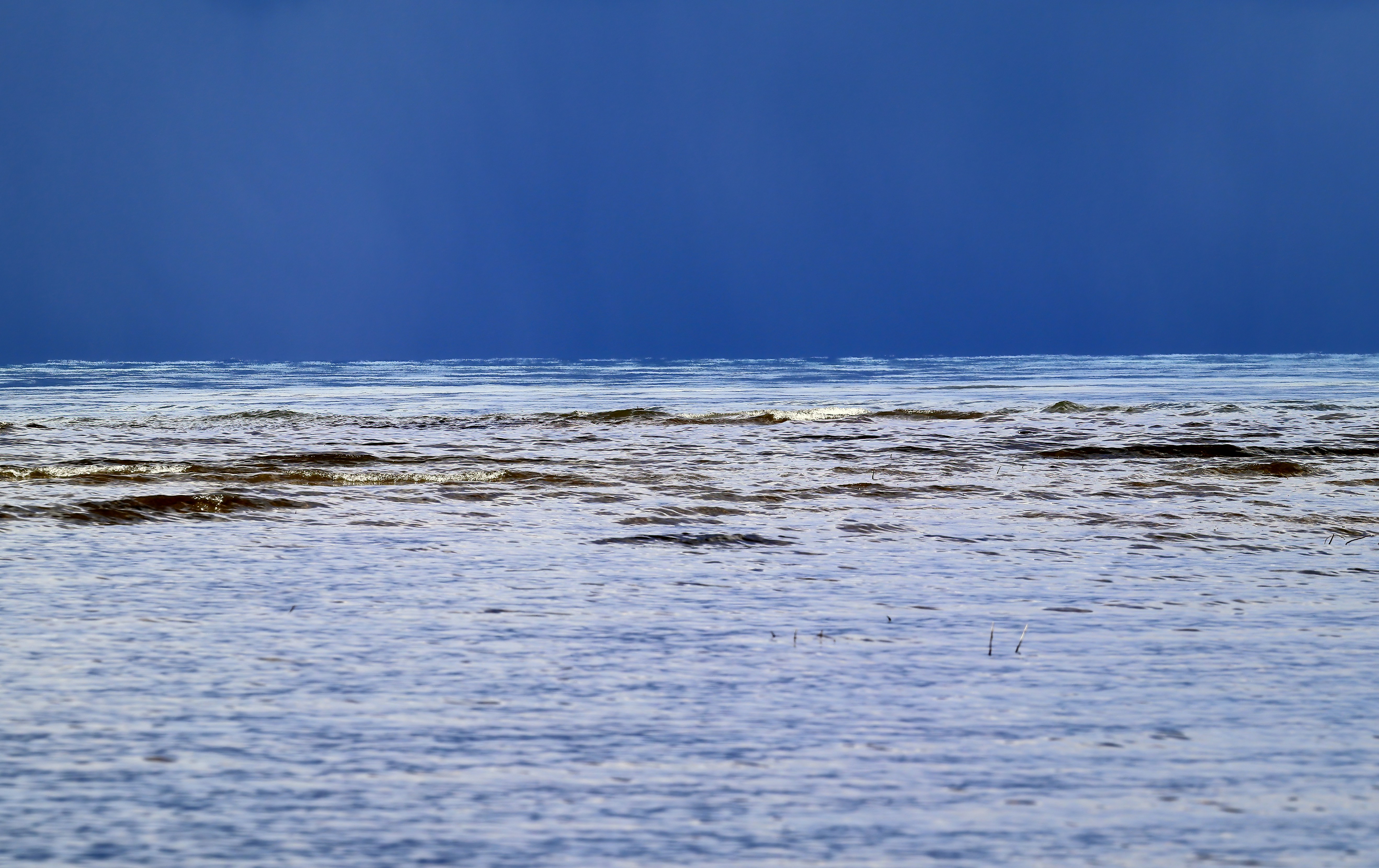 Snorkeler enjoying the clear waters of Molokini Crater