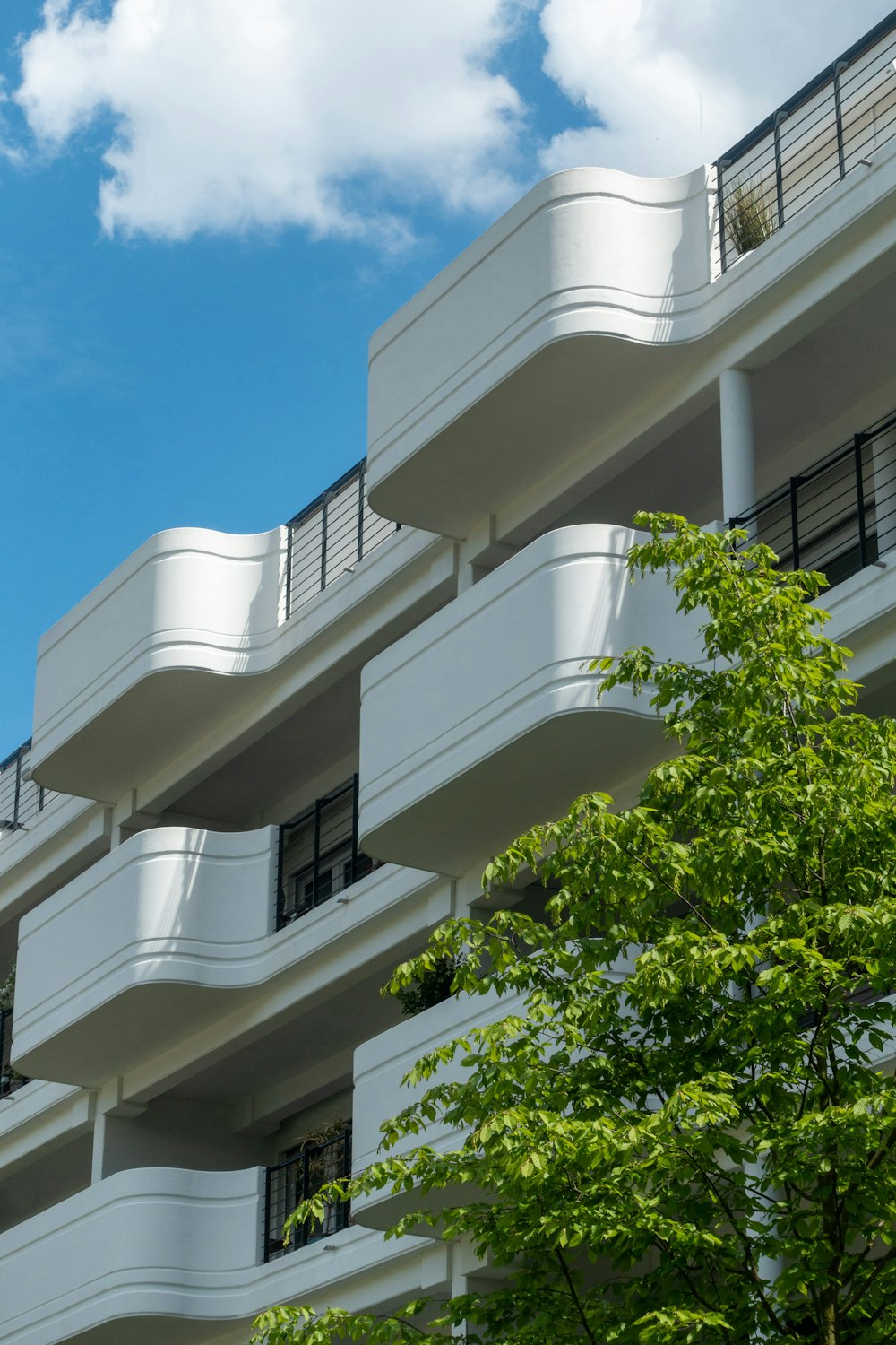 white concrete building under blue sky during daytime