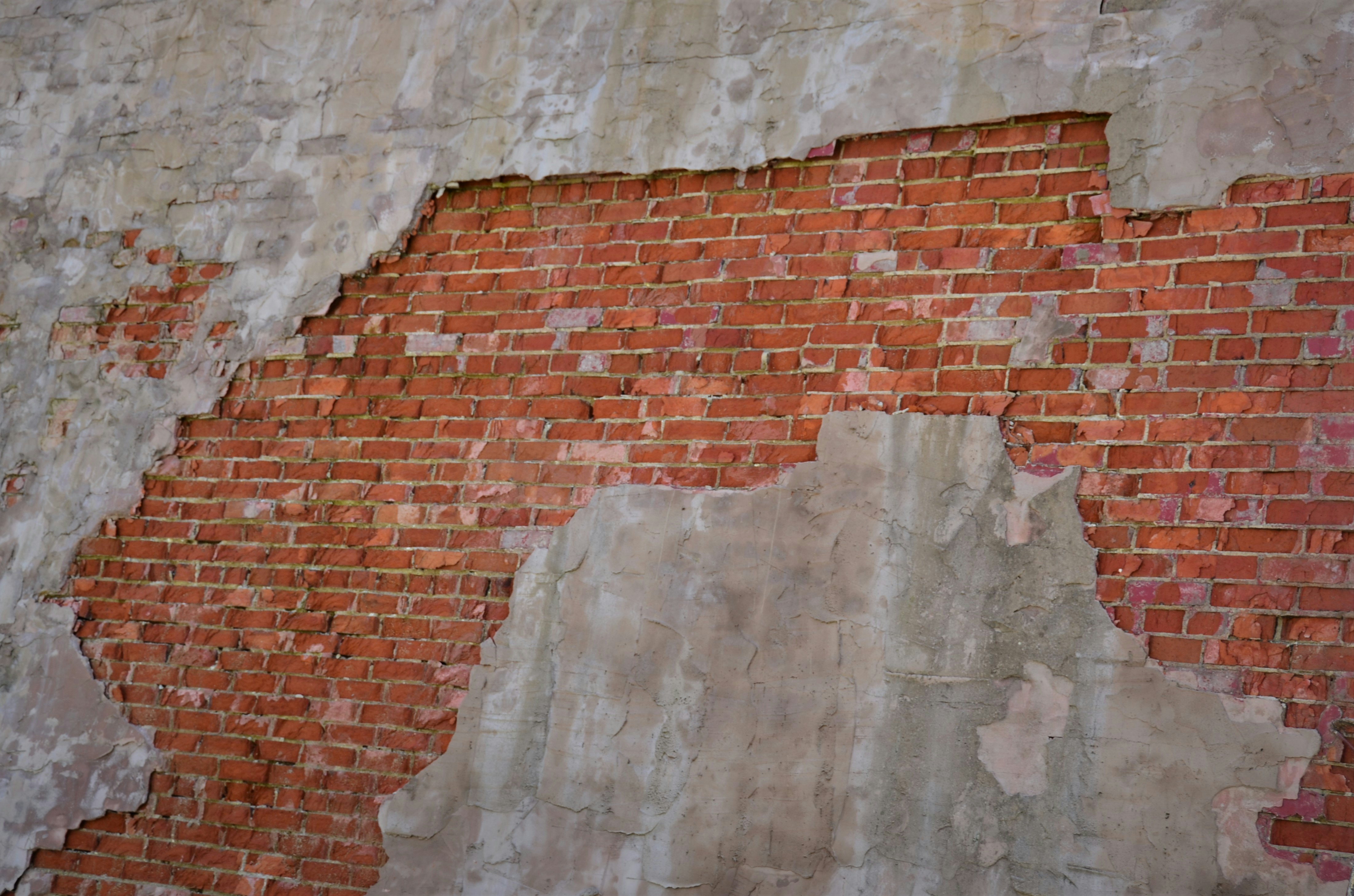 brown brick wall during daytime