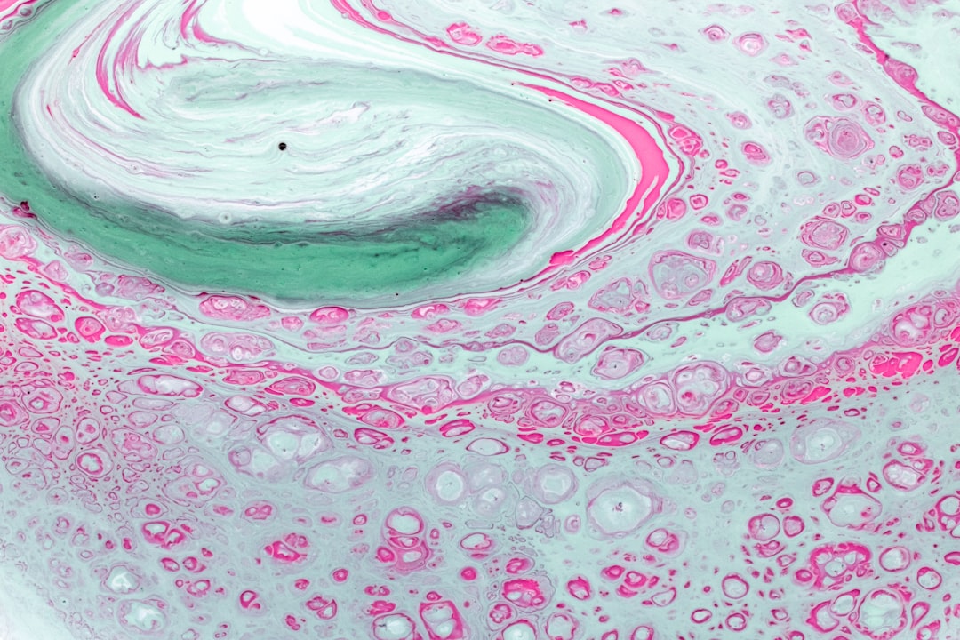 pink white and green abstract painting