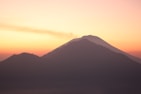 silhouette of mountain during sunset