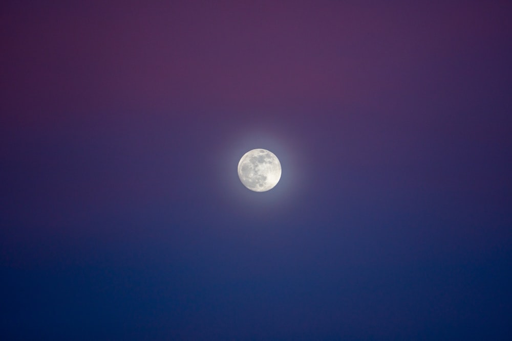 full moon in blue sky