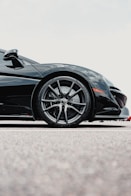 black ferrari 458 italia on road