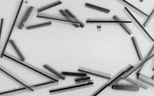 gray metal tools on white surface