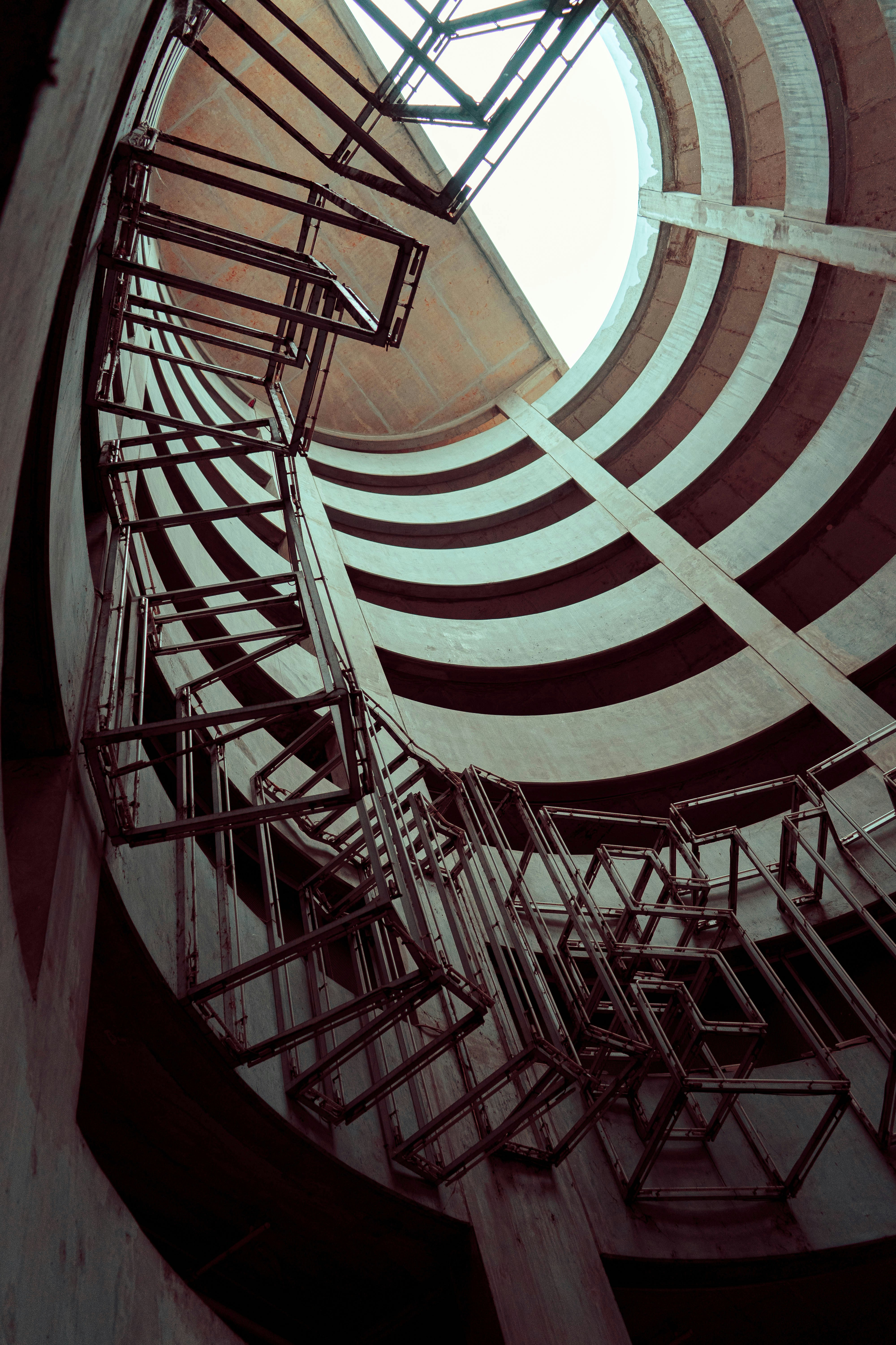 white and brown spiral staircase