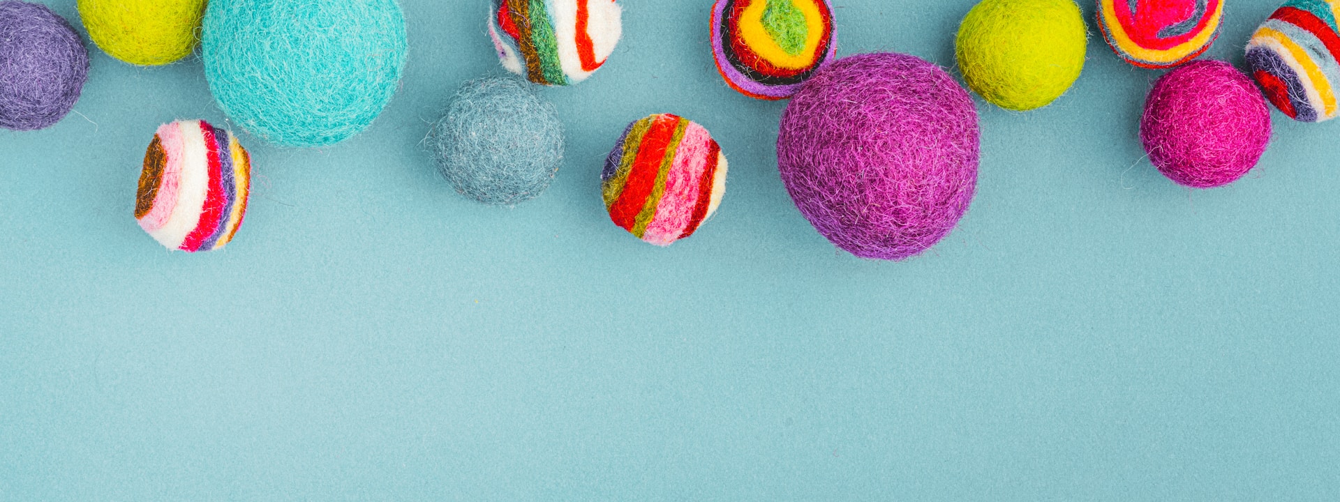 white pink yellow and blue round ornament
