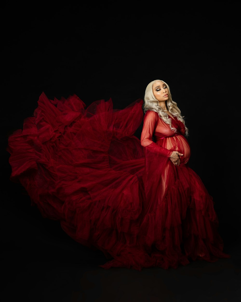 woman in red dress with white hair