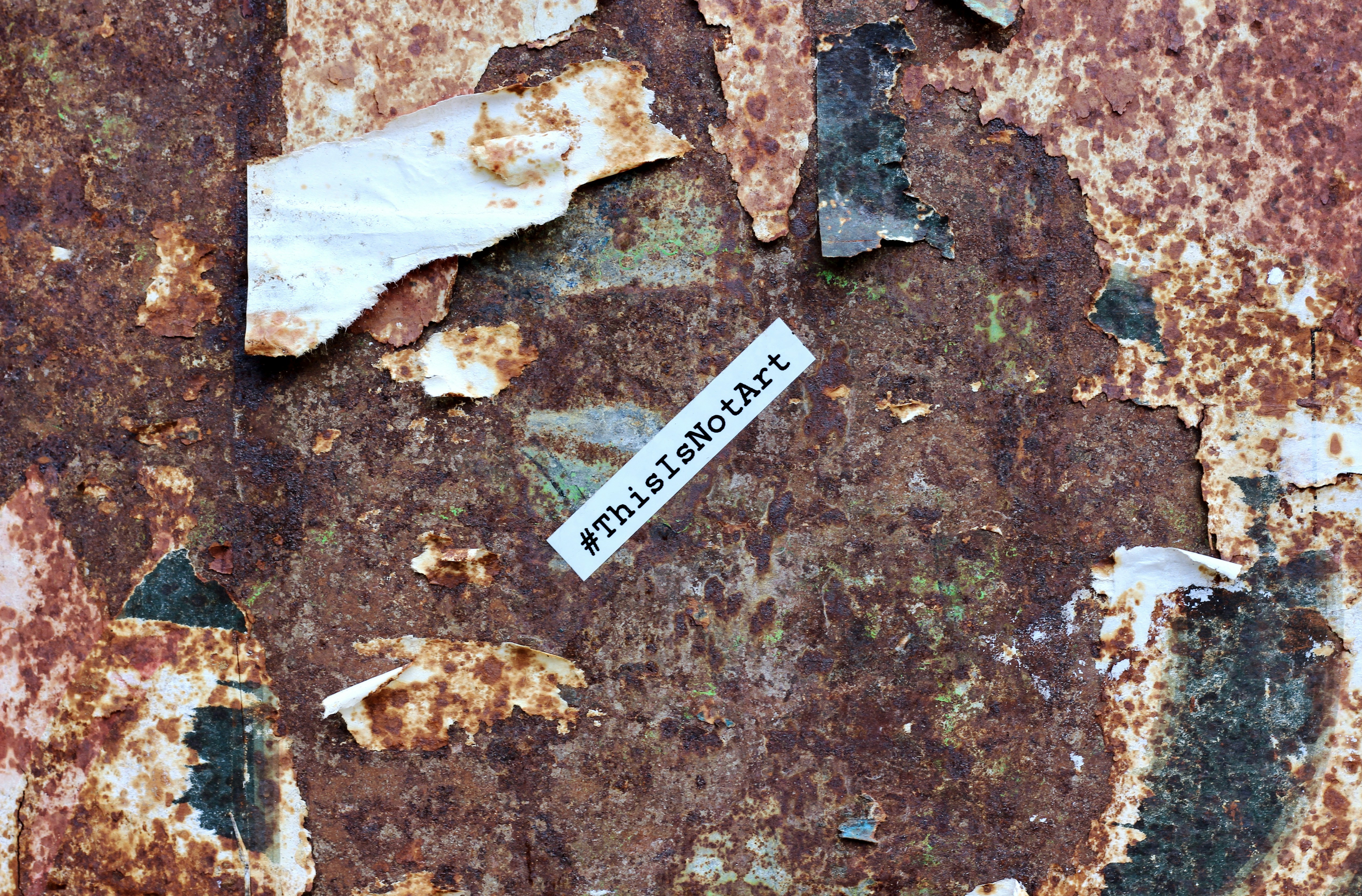 white printer paper on brown concrete floor