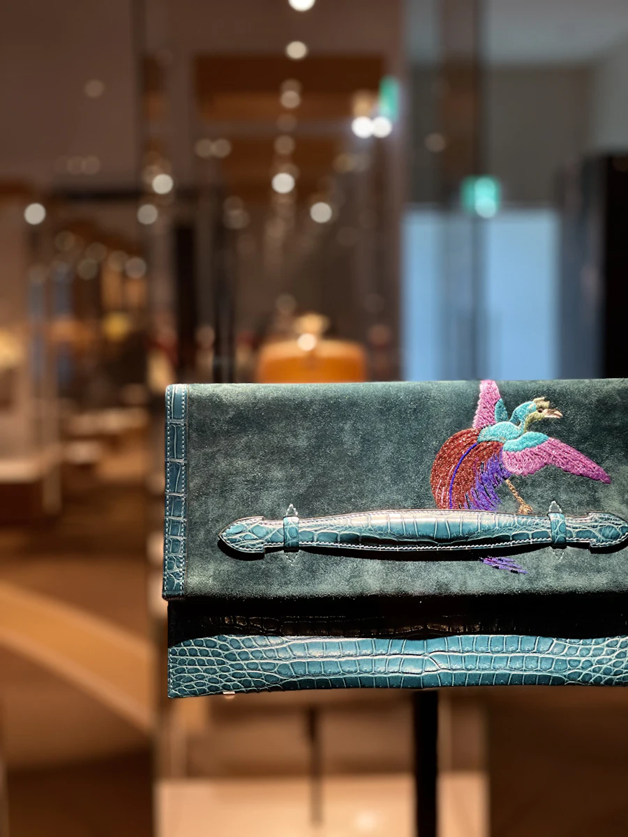Teal velvet envelope clutch with floral embroidery
