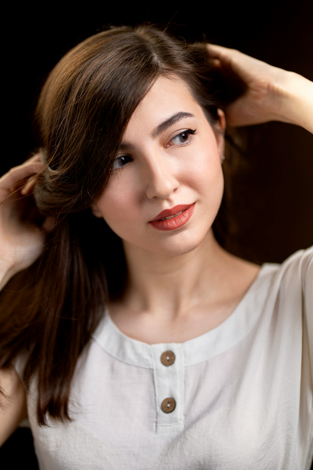 woman in white button up shirt