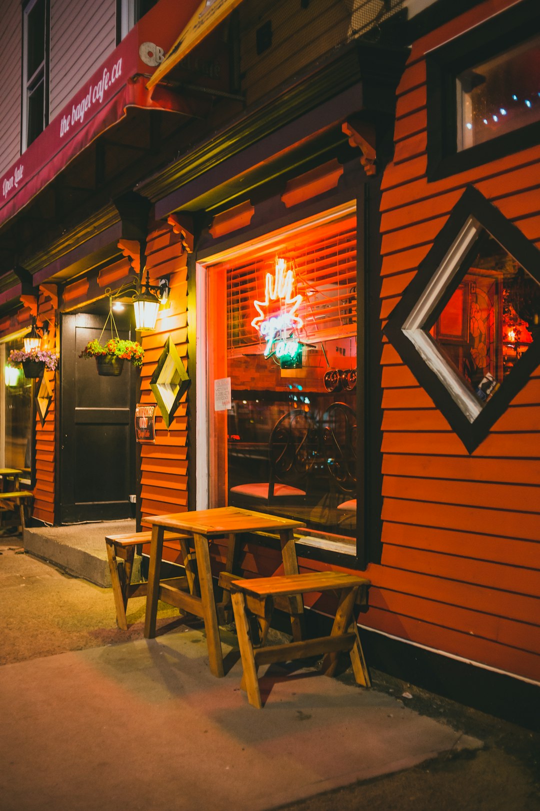 brown wooden table and chairs near store