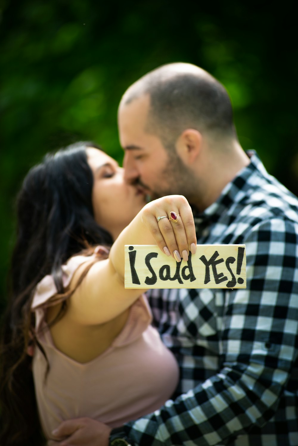 man kissing womans cheek