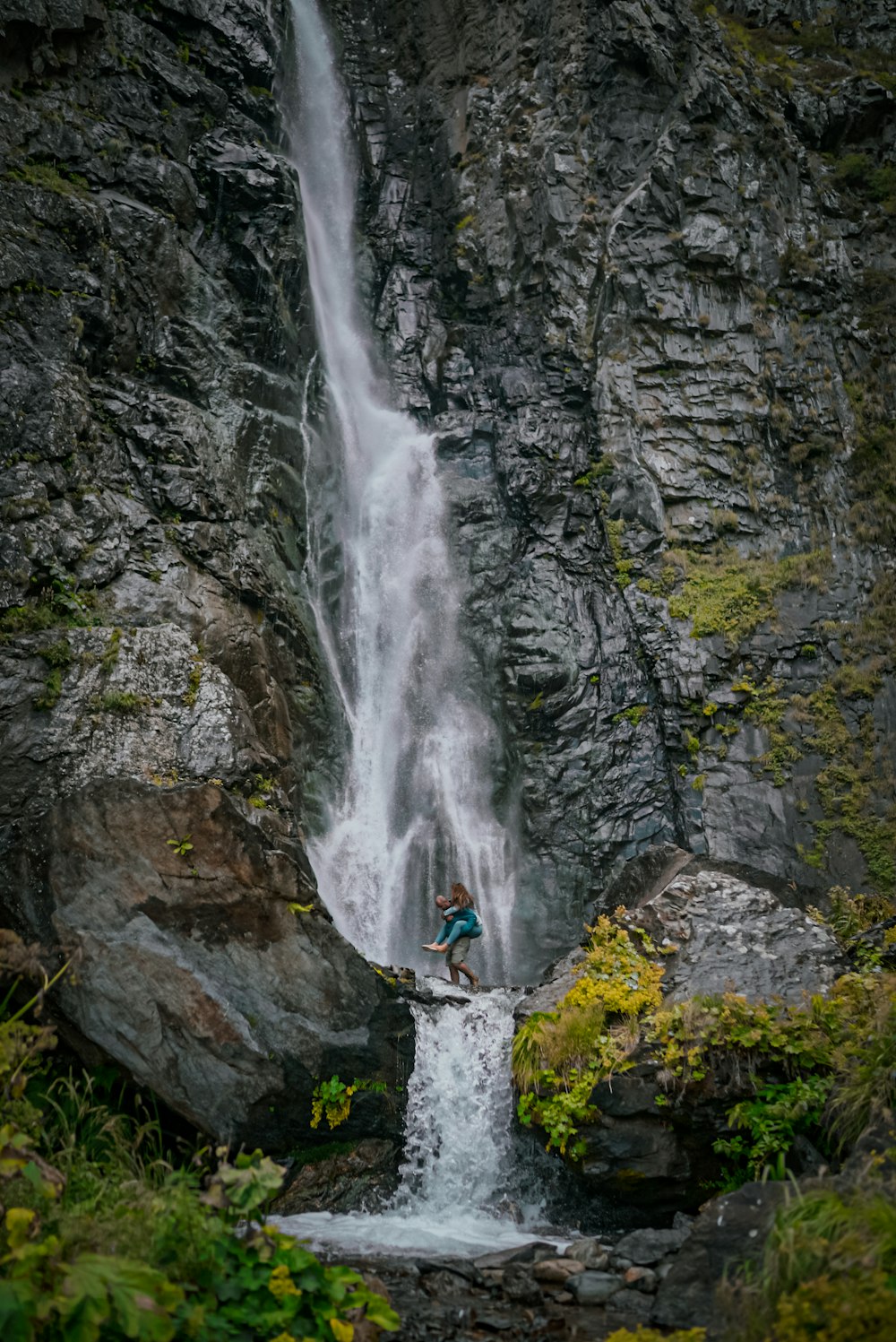 water falls on rocky mountain