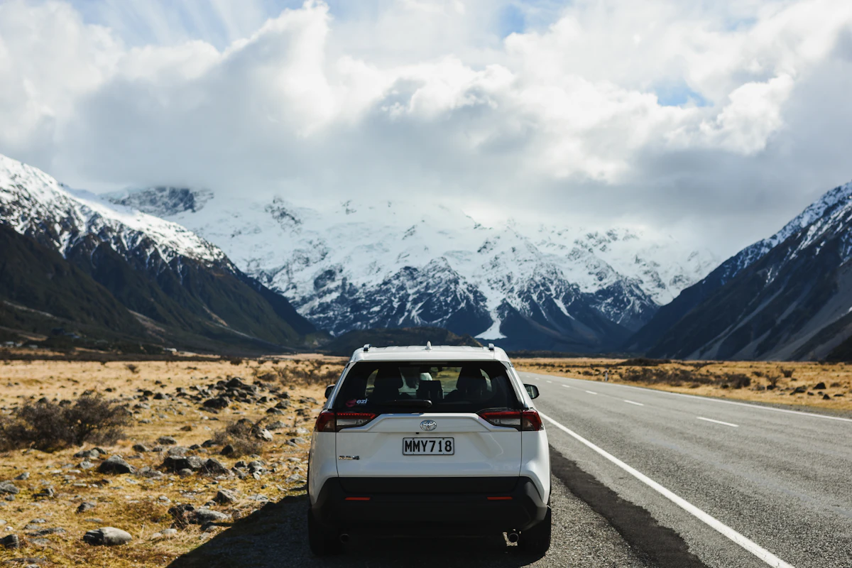 SUV on a scenic mountain road