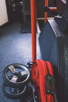 Close-up of the stroller’s shock absorption system in action on a bumpy path.