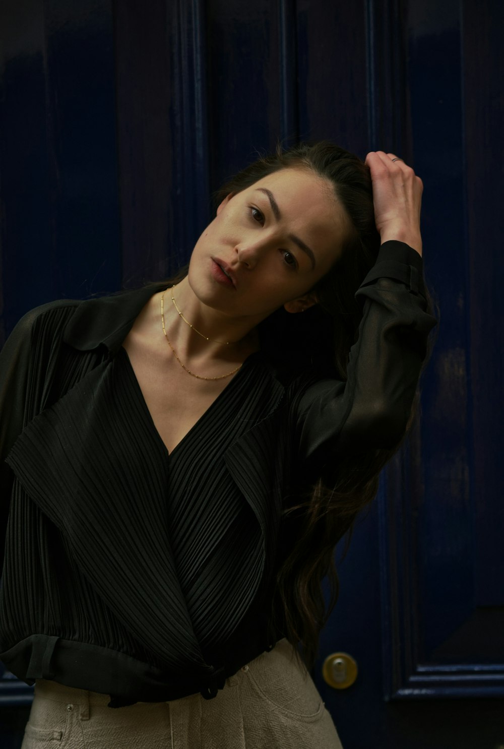 woman in black and white pinstripe blazer