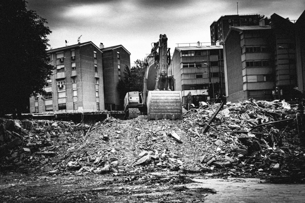 grayscale photo of building near body of water