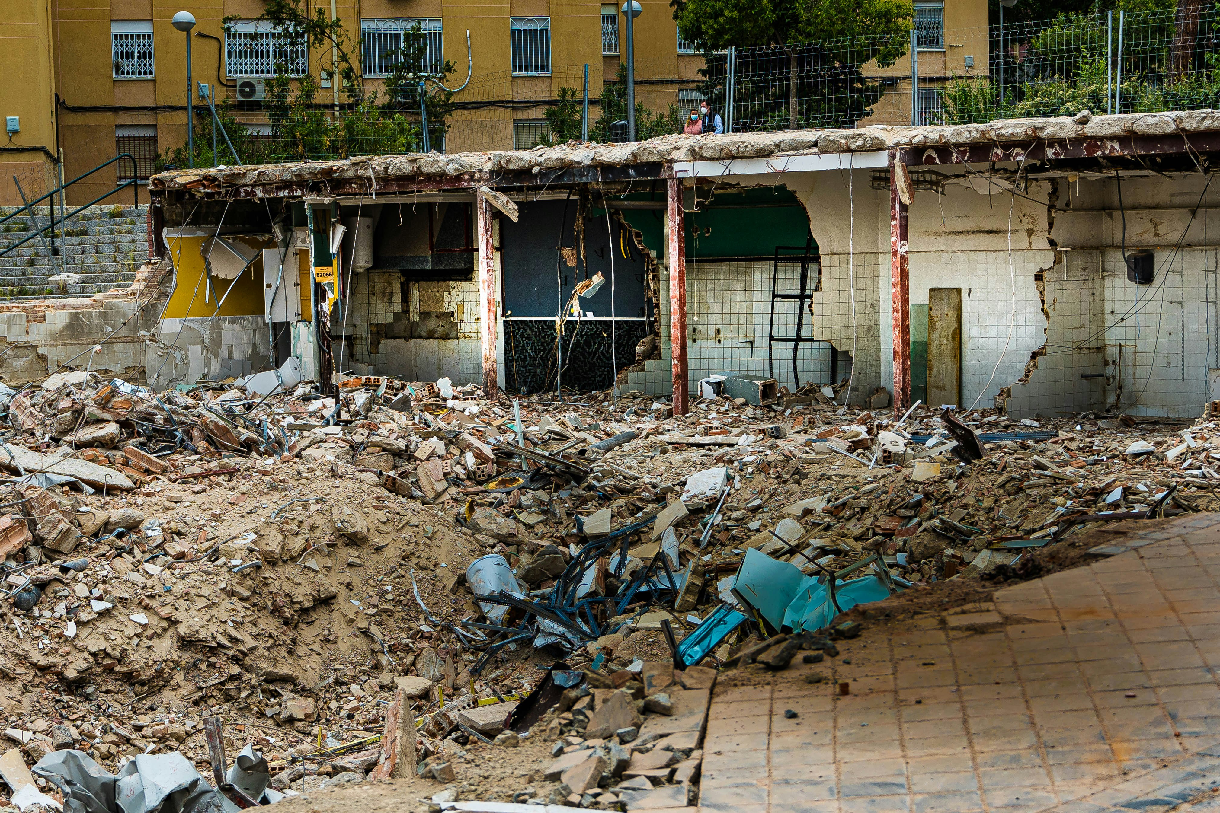 garbage on the ground near the building