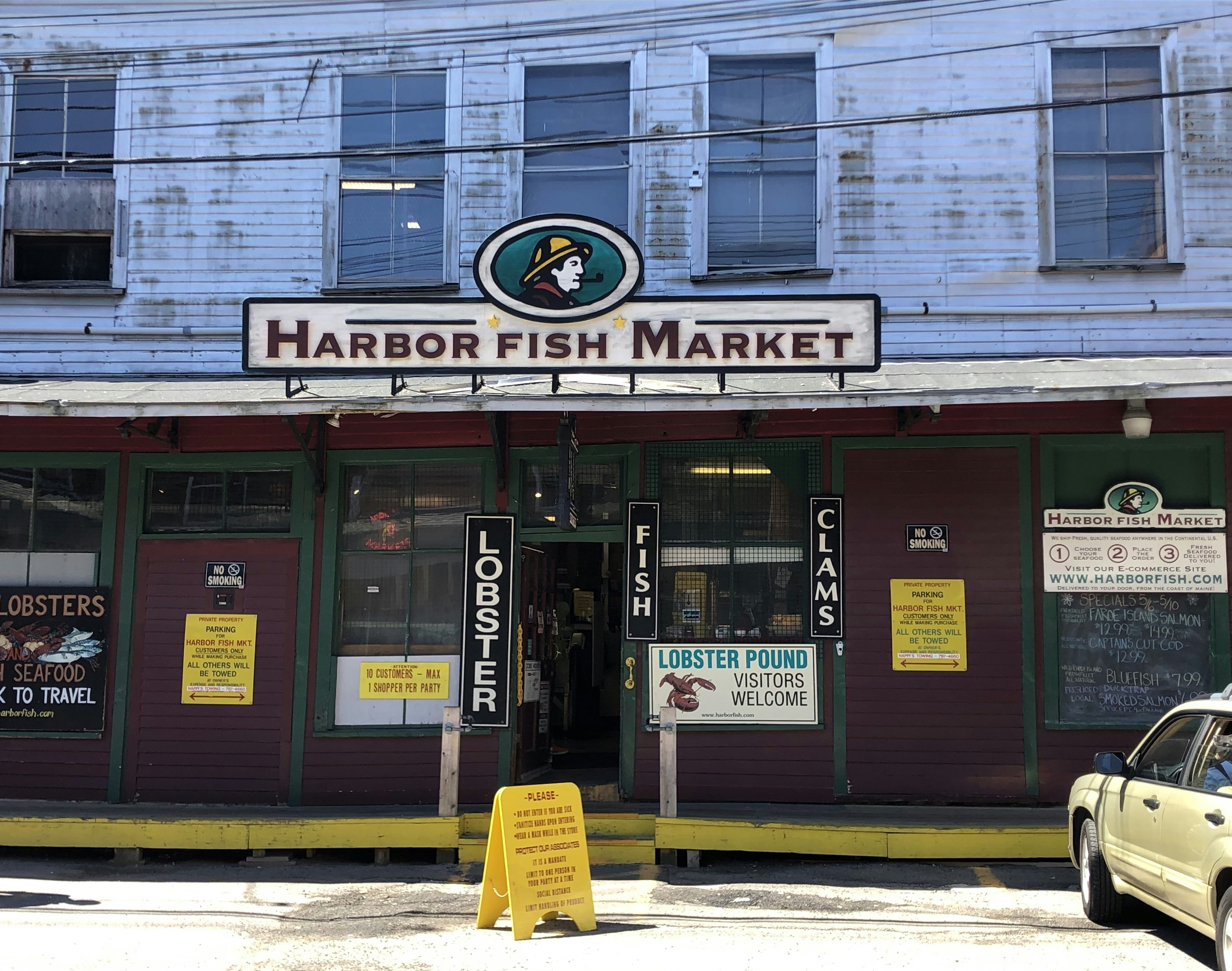 yellow plastic bag on yellow plastic chair, Harbor Fish Market in Portland, Maine