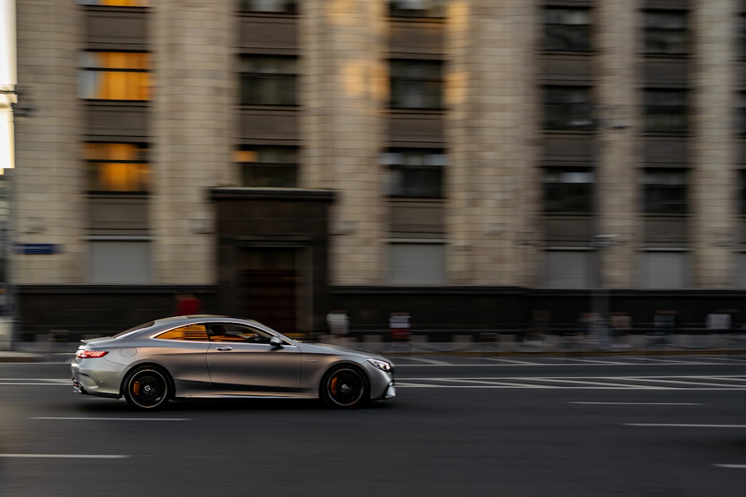 silver porsche 911 on road during daytime