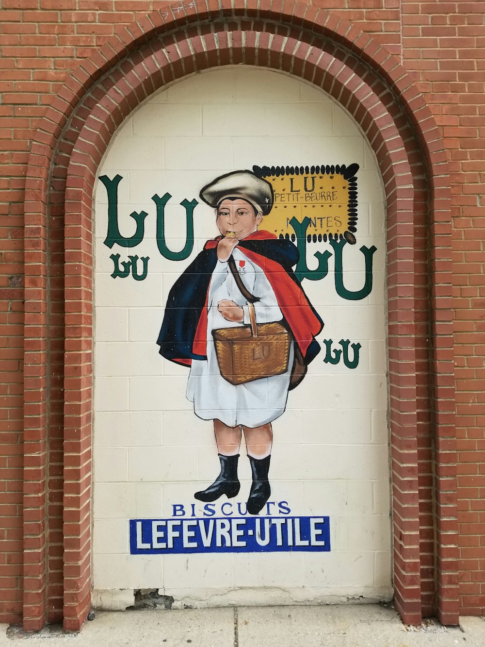 man in blue and white school uniform