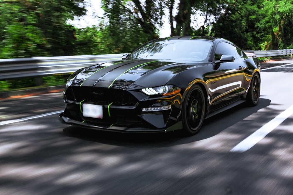 black bmw m 3 on road during daytime