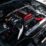 black and red car engine bay