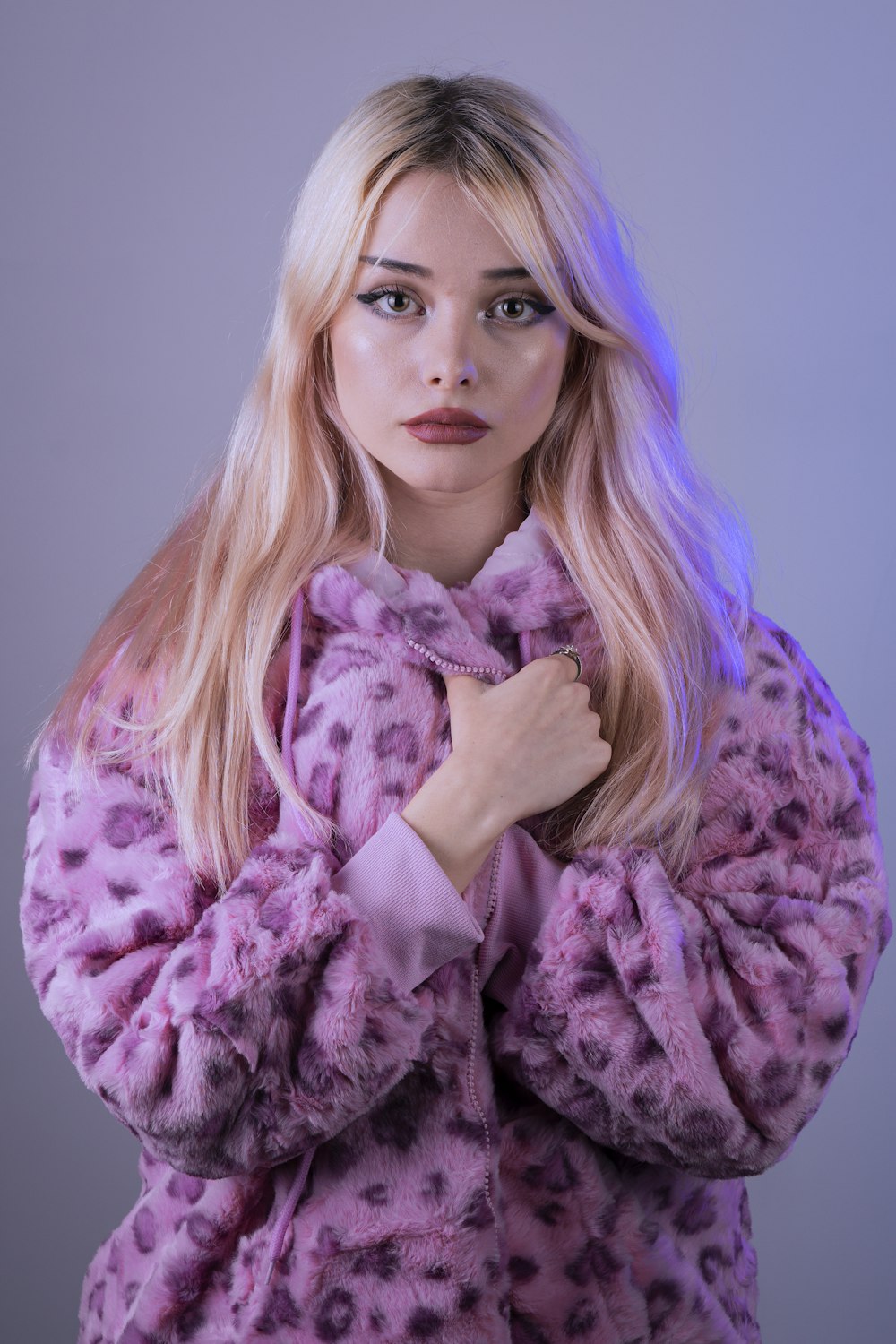 woman in purple and white floral robe