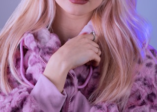 woman in purple fur coat