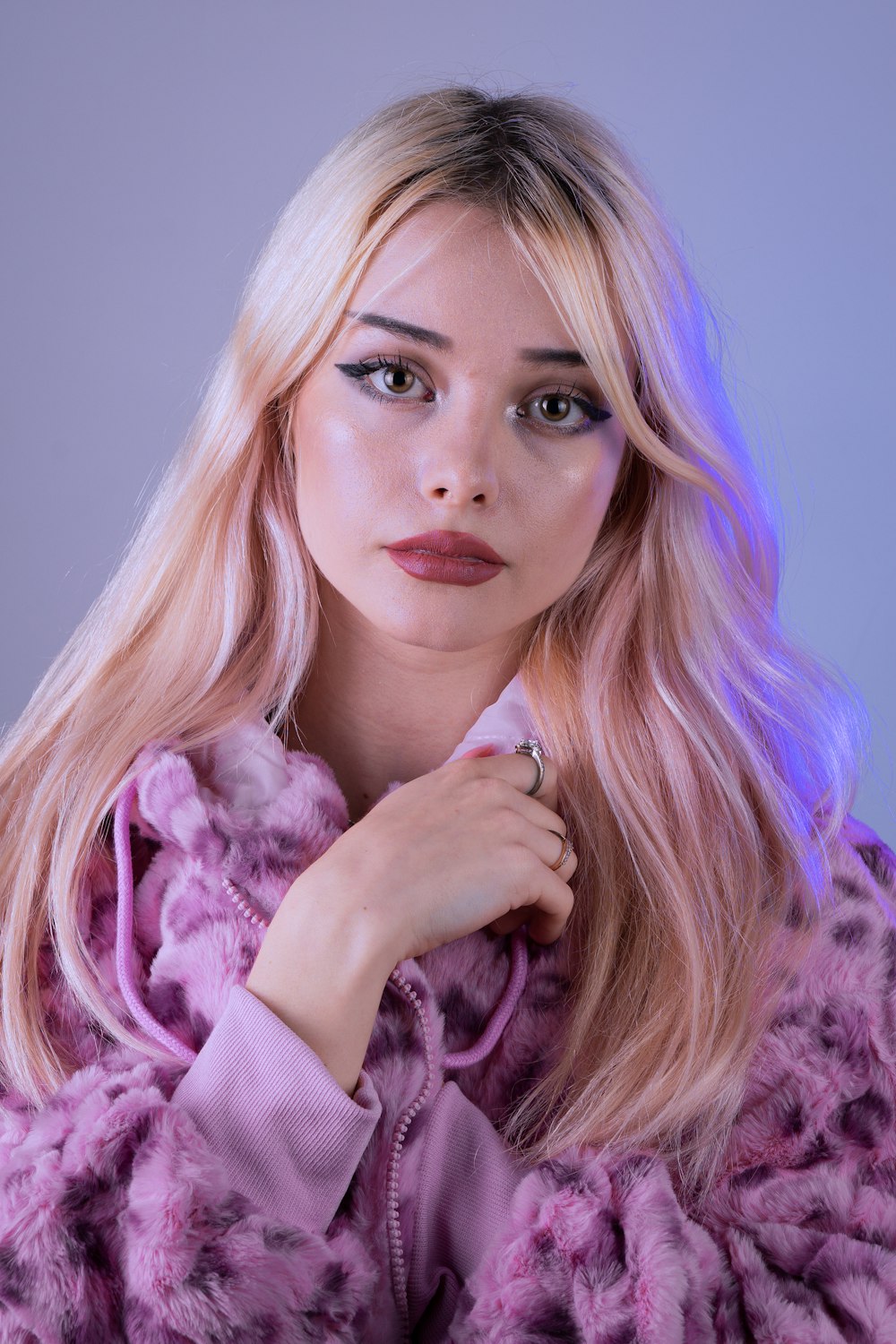 woman in purple fur coat