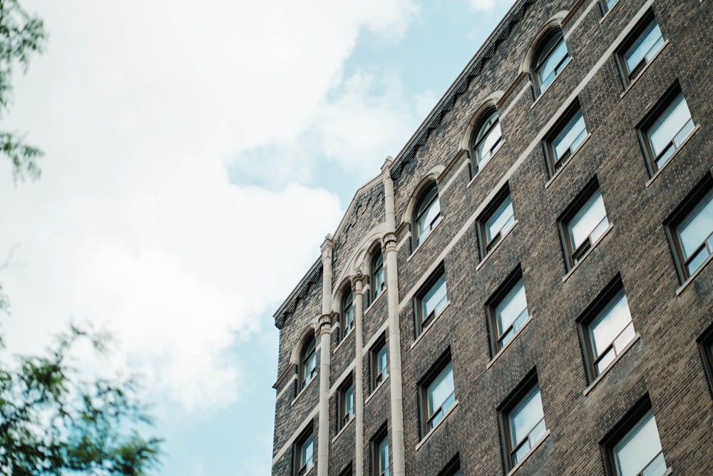 brown concrete building under white sky during daytime