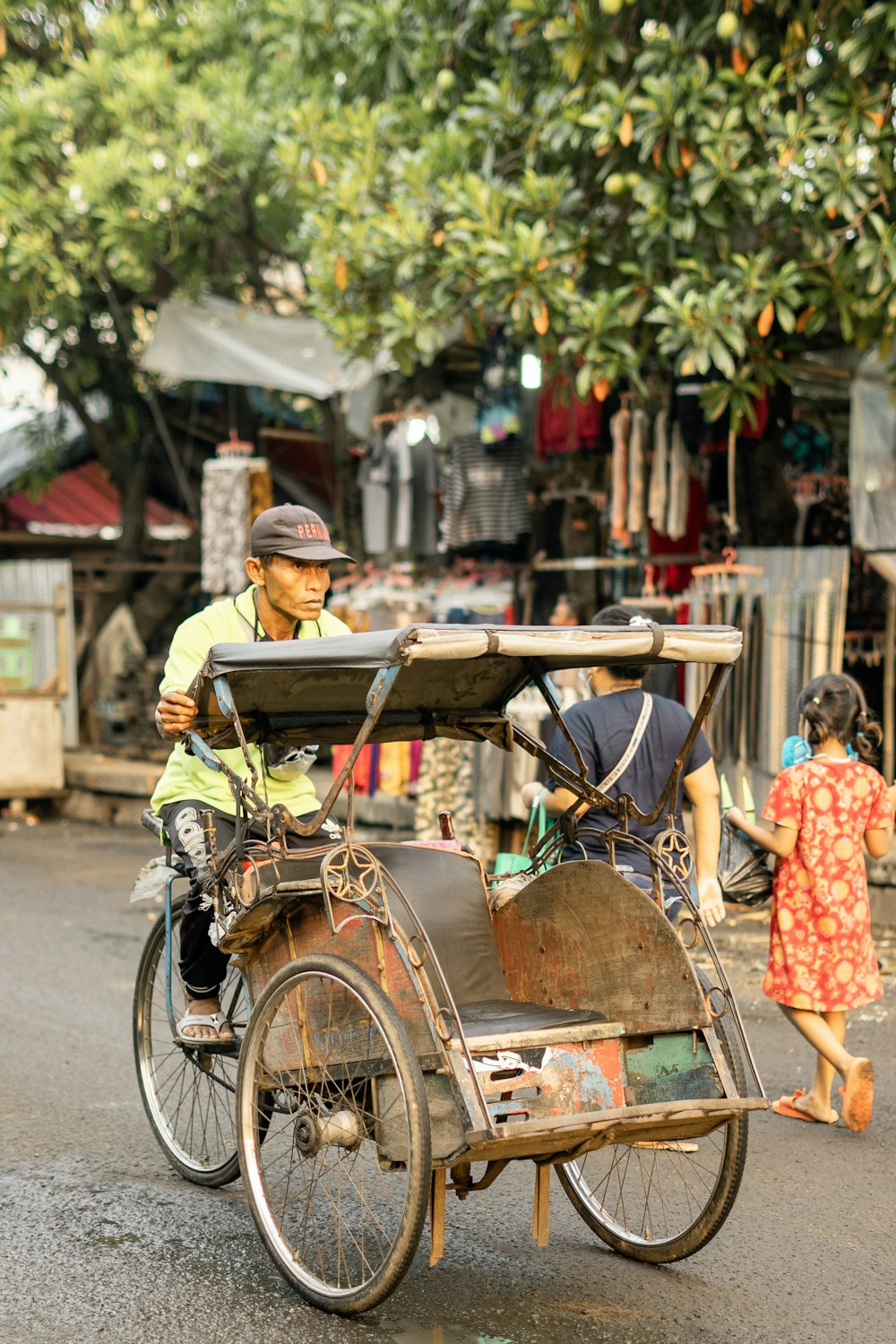 people in brown wooden cart during daytime