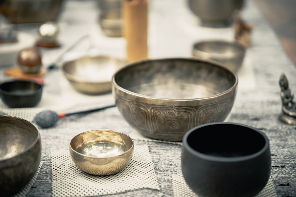 stainless steel bowl on white table cloth