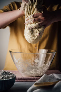 person holding white ice cream
