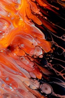 orange and black abstract painting